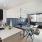 open concept apartment interior with ample lighting throughout