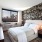 accent wallpaper in bright bedroom