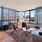 spacious living room with massive windows